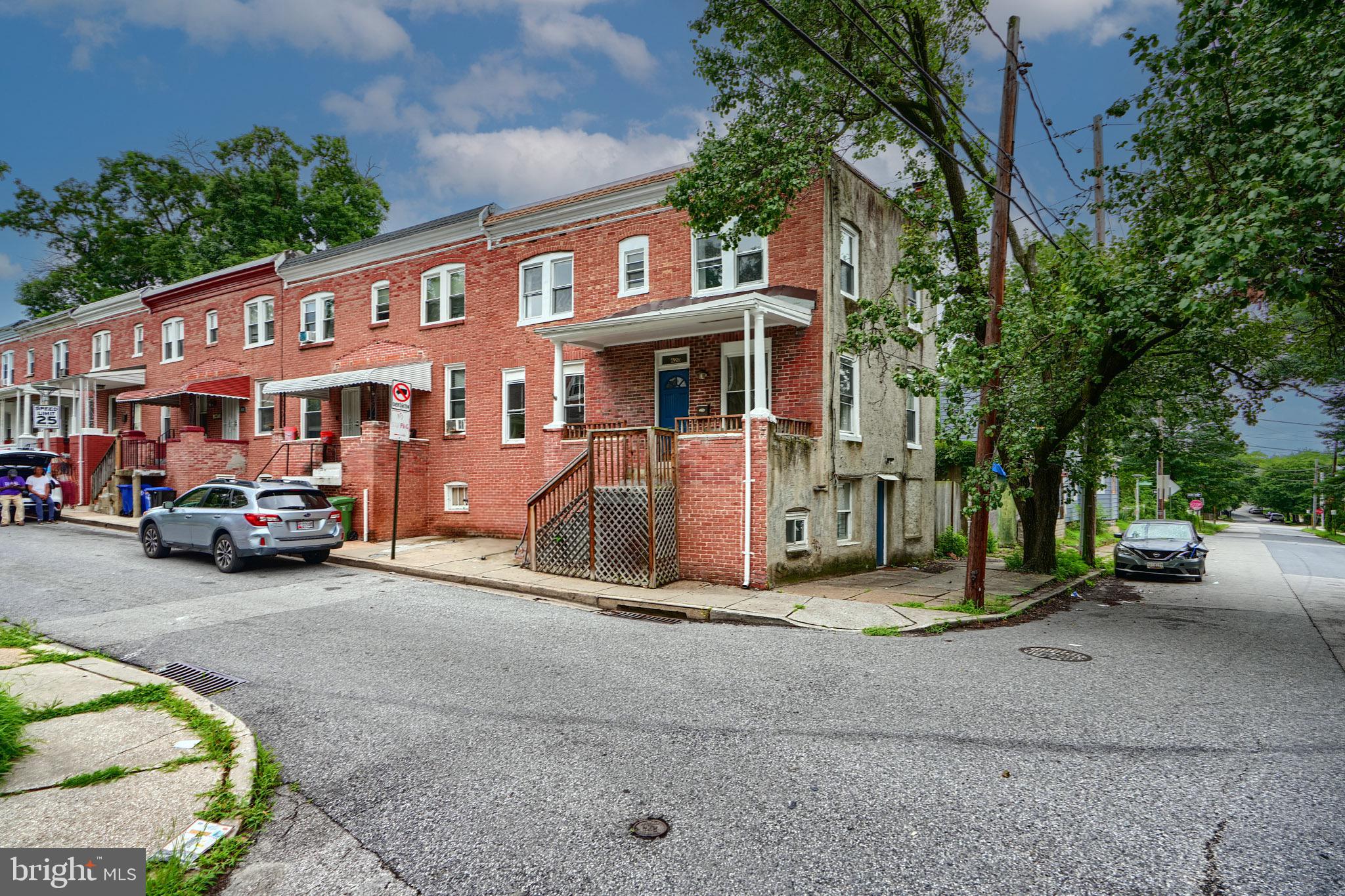 620 Montpelier Street, Unit 1 Baltimore, MD 21218 - Photo 2 of 29 a view of a car park in front of house