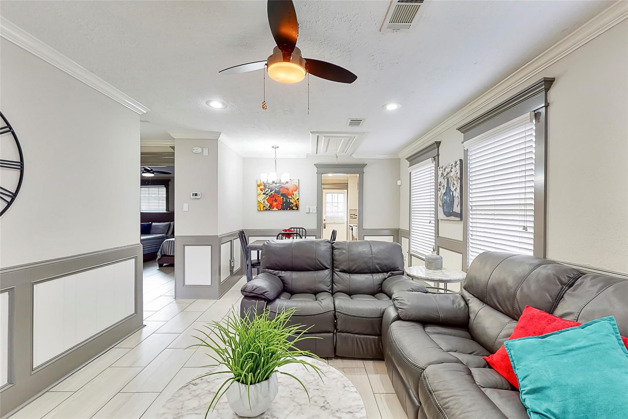 7825 Cook Road Houston, TX 77072 - Photo 8 of 13 a living room with furniture ceiling fan and a window