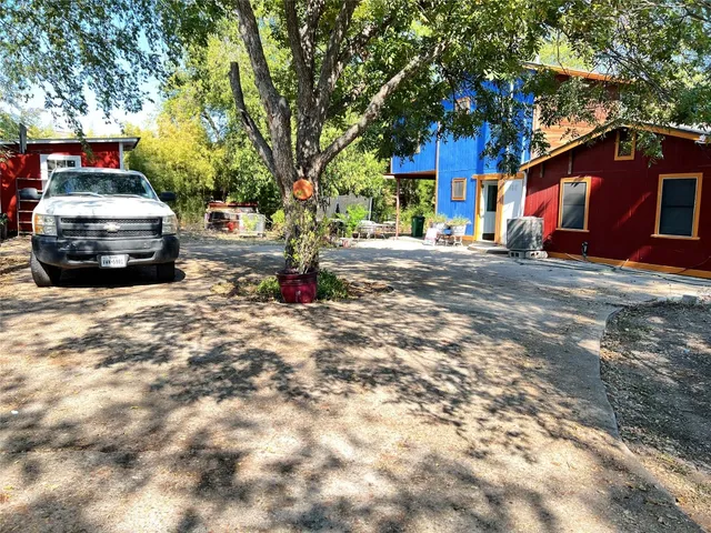a car parked in front of a house