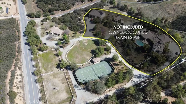 an aerial view of a highlighted house