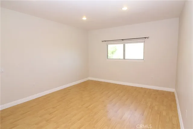 a view of swimming pool with lake and mountain view