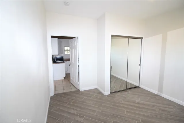 a view of a swimming pool with an outdoor seating and a mountain view