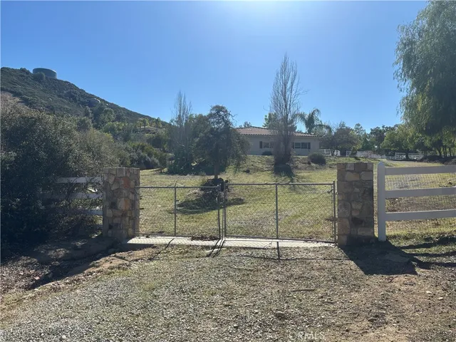 a kitchen with a sink and a refrigerator