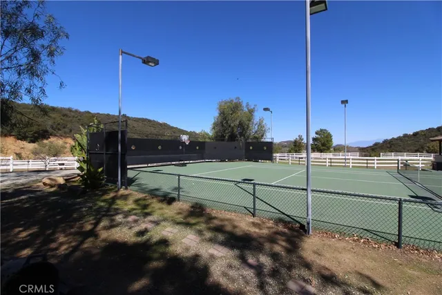 a view of an ocean and mountains