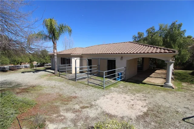 a view of a house with a patio