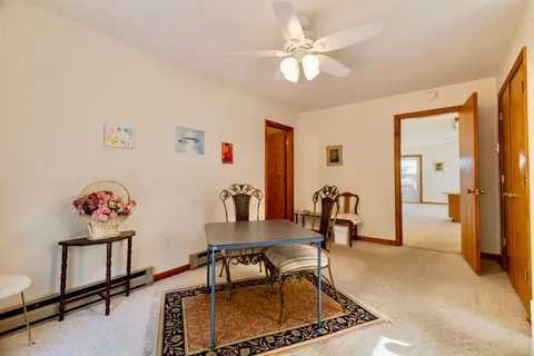 a living room with furniture and a table