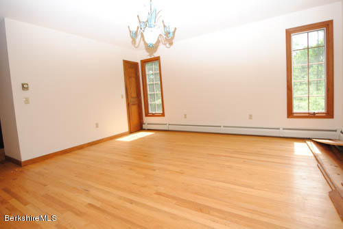 96 Scacebrook Road Richmond, MA 01201 - Photo 13 of 25 a view of an empty room with a window