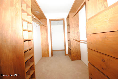 96 Scacebrook Road Richmond, MA 01201 - Photo 22 of 25 a view of walk in closet and bedroom