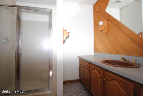 96 Scacebrook Road Richmond, MA 01201 - Photo 24 of 25 a bathroom with a granite countertop sink and a mirror