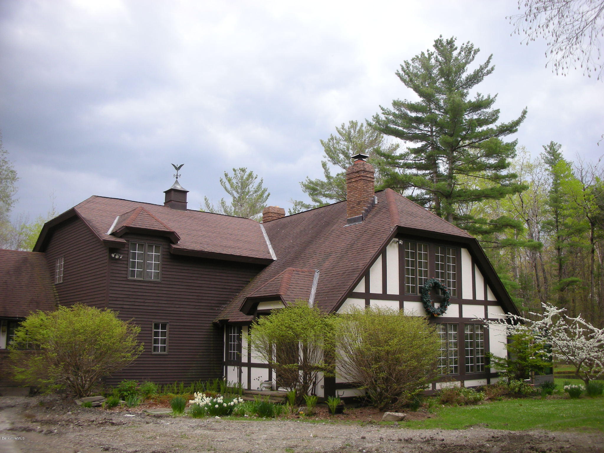 96 Scacebrook Road Richmond, MA 01201 - Photo 6 of 25 a front view of a house with a yard and garage