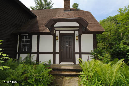 96 Scacebrook Road Richmond, MA 01201 - Photo 9 of 25 a front view of a house with a garden