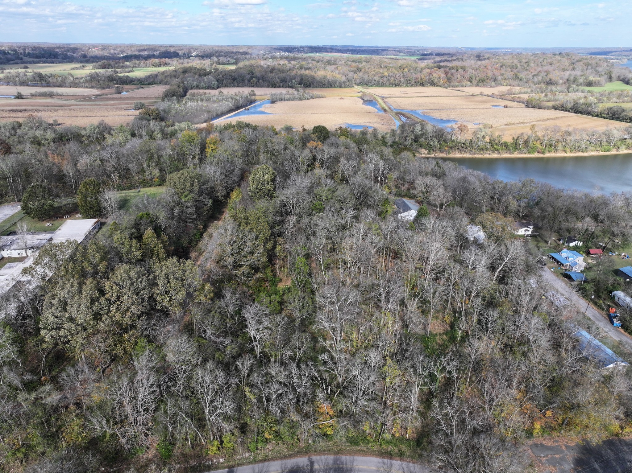 0 Palmyra Road Palmyra, TN 37142 - Photo 3 of 13 a view of a lake with a mountain