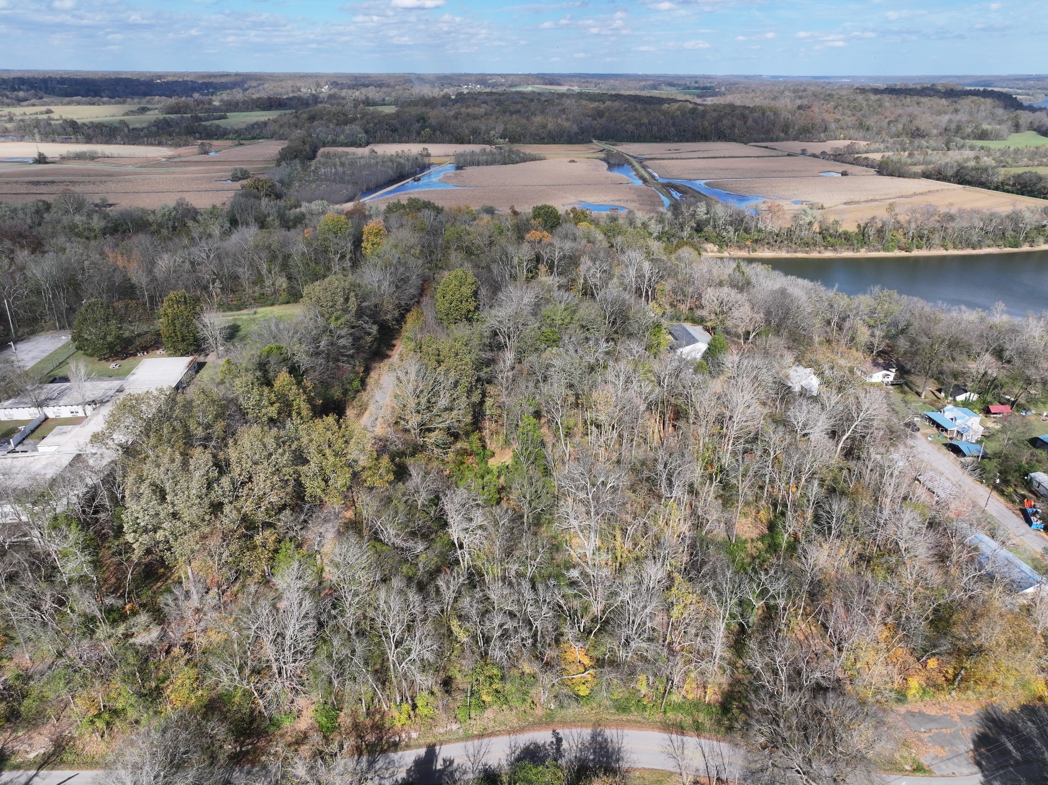 0 Palmyra Road Palmyra, TN 37142 - Photo 6 of 13 a view of a water surrounded by trees