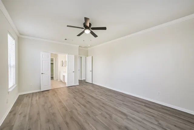 a bathroom with a double vanity sink mirror and a mirror