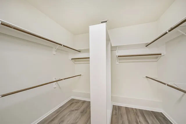 a view of an empty walk in closet