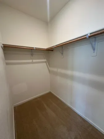 a view of swimming pool with furniture