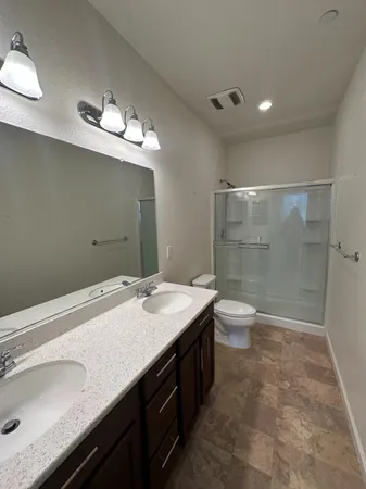 a view of backyard with garage