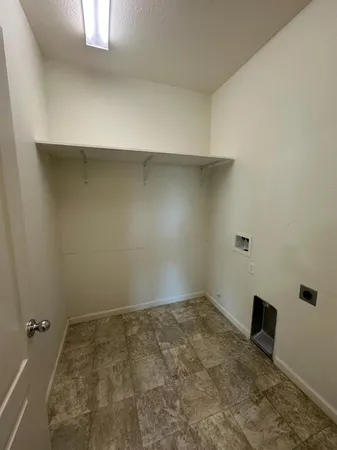 a view of backyard with garage