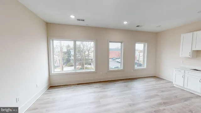 an empty room with windows