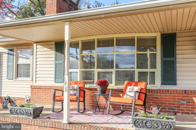 front view of a house with a big yard