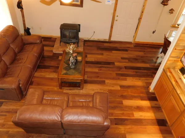 a couch sitting in backside of a building