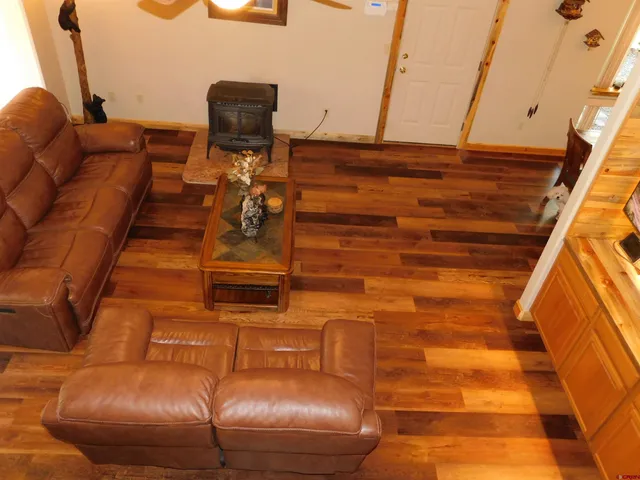 a couch sitting in backside of a building