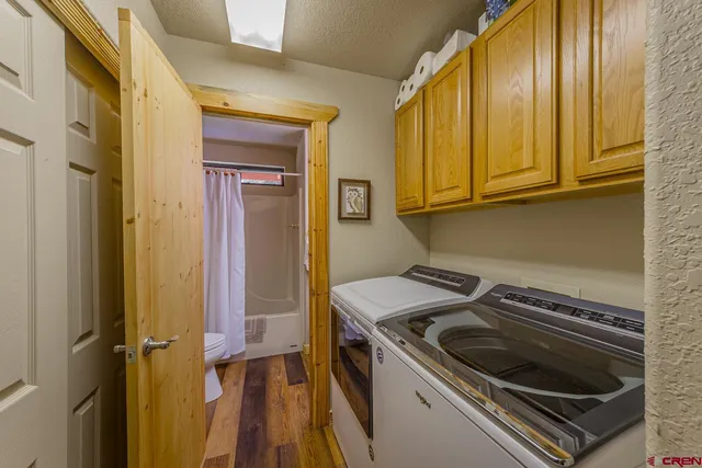 a kitchen with a stove and a microwave