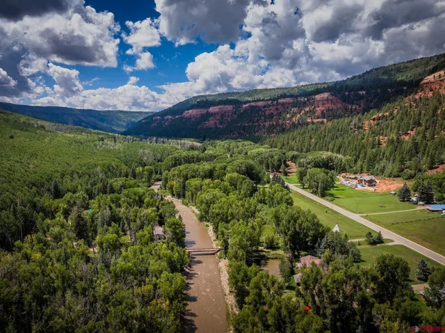 a view of a lake with a city