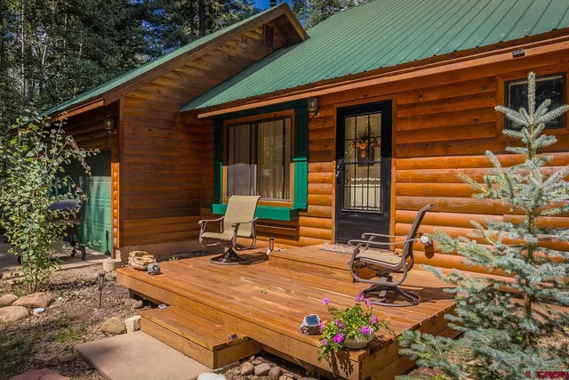 a backyard of a house with seating space