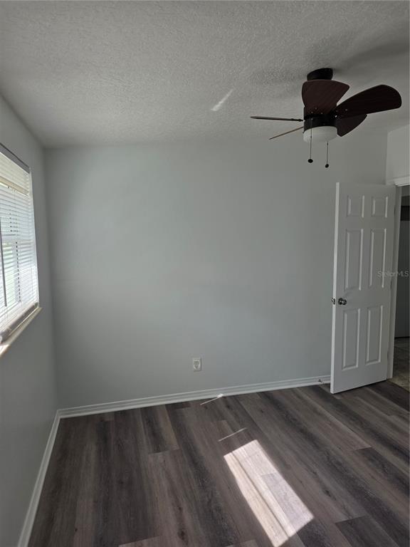 298 11th Avenue Southwest Largo, FL 33770 - Photo 20 of 34 wooden floor in an empty room