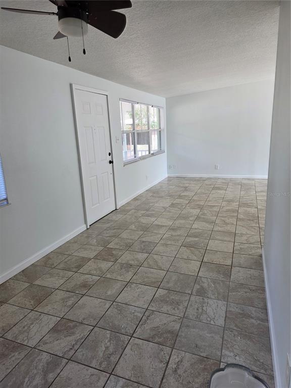 298 11th Avenue Southwest Largo, FL 33770 - Photo 23 of 34 a view of an empty room and window