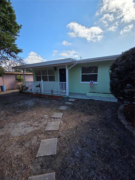 298 11th Avenue Southwest Largo, FL 33770 - Photo 30 of 34 a view of a house with a backyard
