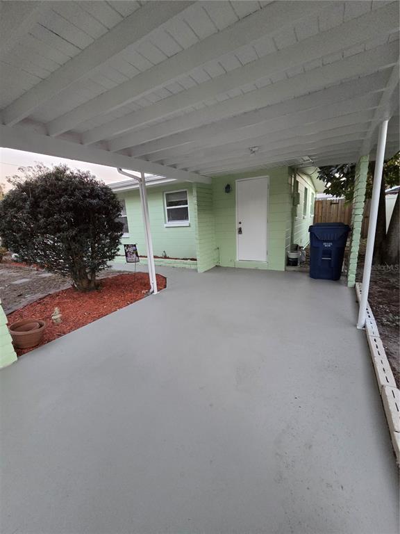 298 11th Avenue Southwest Largo, FL 33770 - Photo 6 of 34 a view of a house with outdoor space and parking