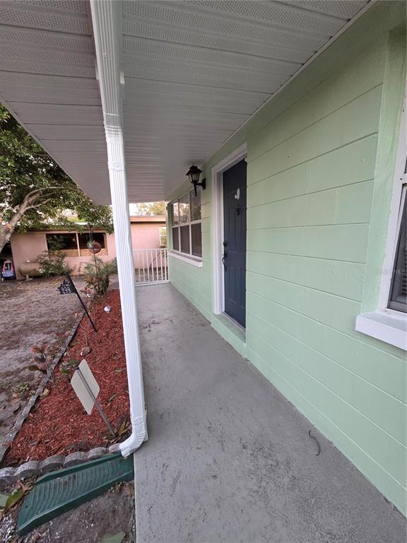 298 11th Avenue Southwest Largo, FL 33770 - Photo 8 of 34 a view of a porch
