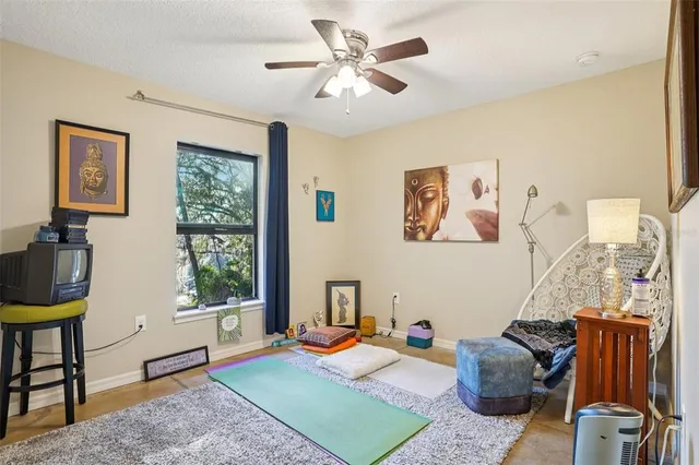 a aerial view of a house with a yard