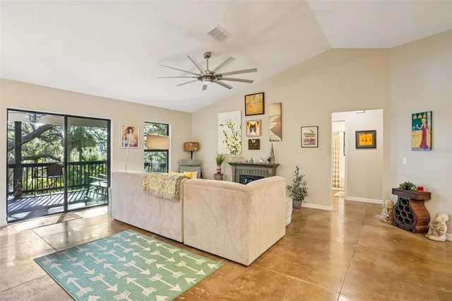 a bathroom with a granite countertop sink a large mirror and a shower