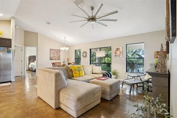 a view of walk in closet with clothes