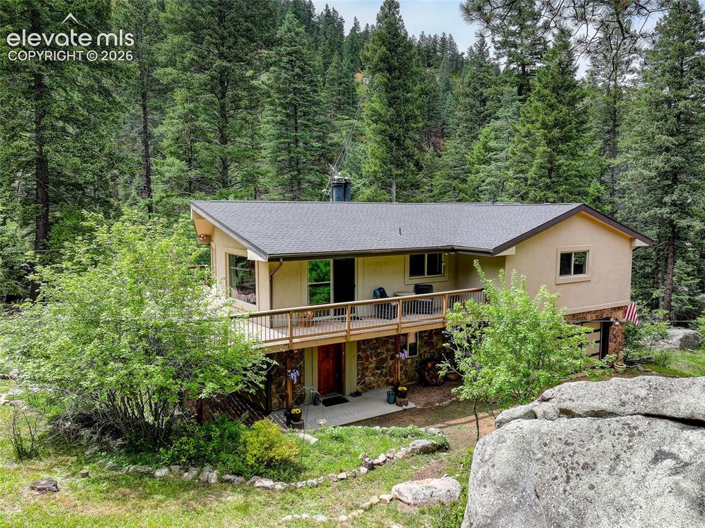 5145 Neeper Valley Road Manitou Springs, CO 80829 - Photo 2 of 49 This home is a raised rancher.