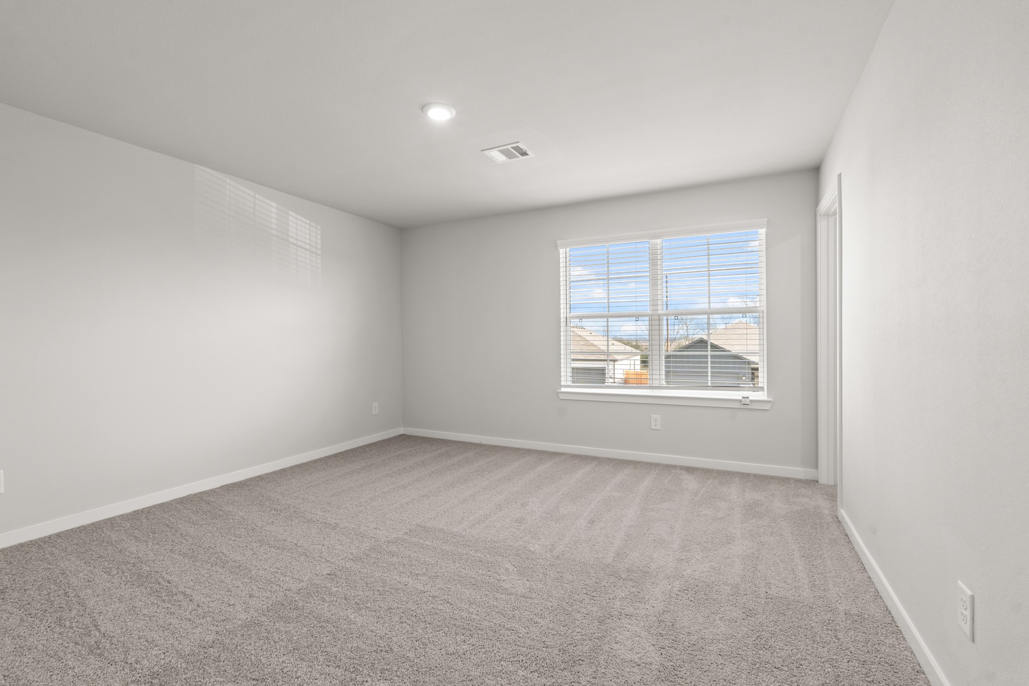 117 Bayou Bend Angleton, TX 77515 - Photo 13 of 28 an empty room with windows