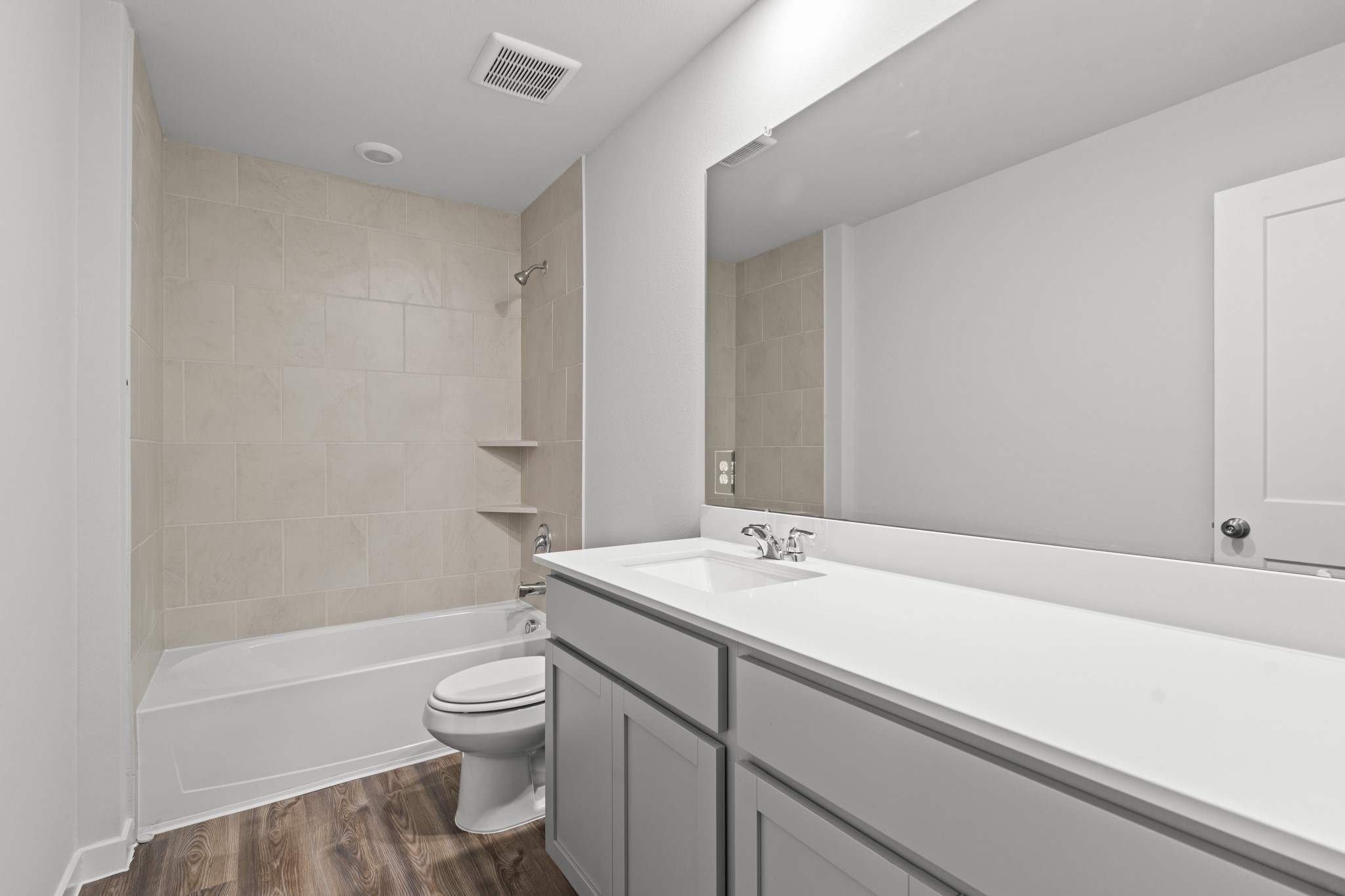 117 Bayou Bend Angleton, TX 77515 - Photo 18 of 28 a bathroom with a sink a toilet and shower