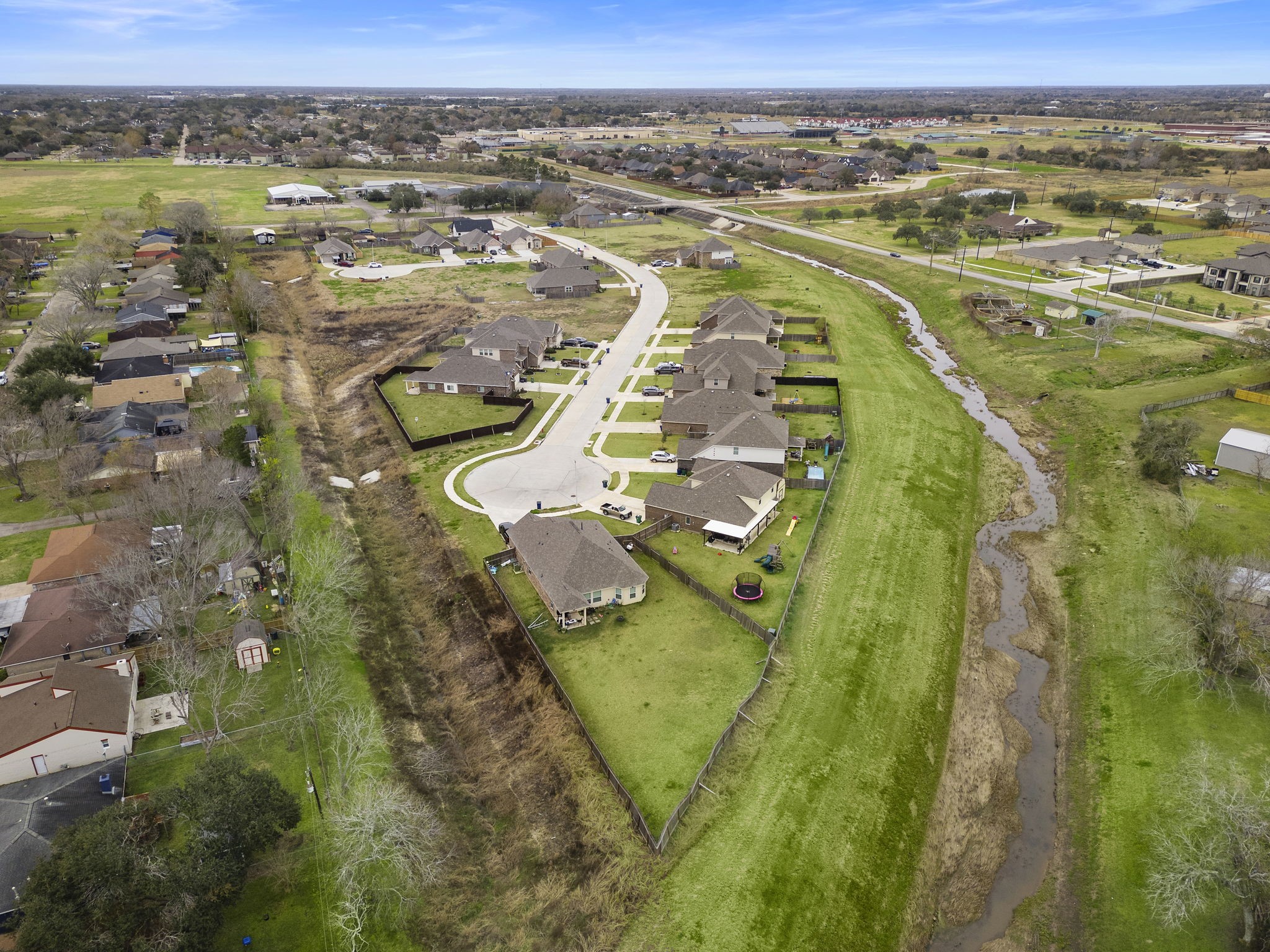 117 Bayou Bend Angleton, TX 77515 - Photo 26 of 28 an aerial view of residential houses with outdoor space