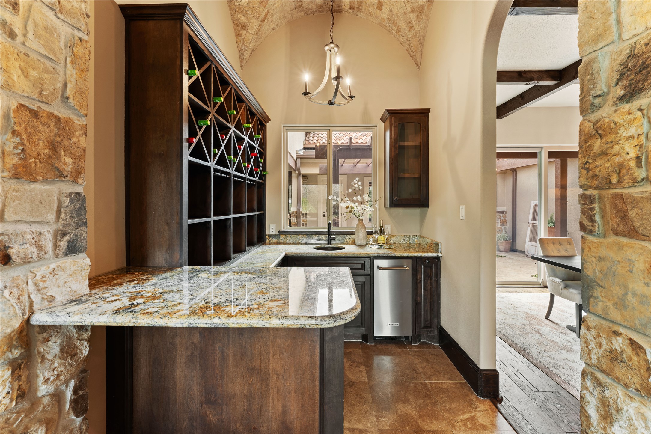 4727 Sugar Maple Court Fulshear, TX 77441 - Photo 9 of 50 a kitchen with a stove and a refrigerator