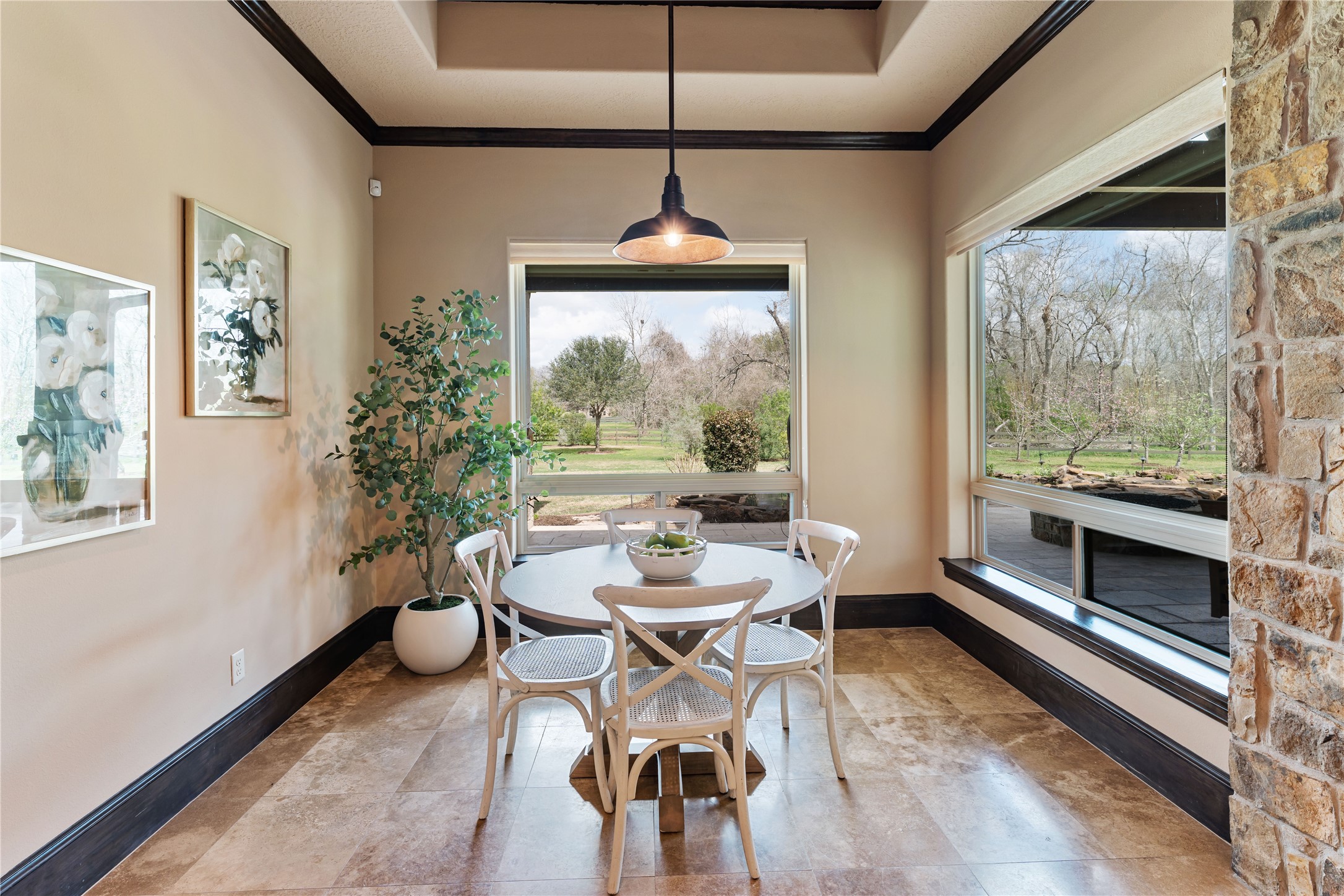 4727 Sugar Maple Court Fulshear, TX 77441 - Photo 13 of 50 a dining room with furniture window wooden floor