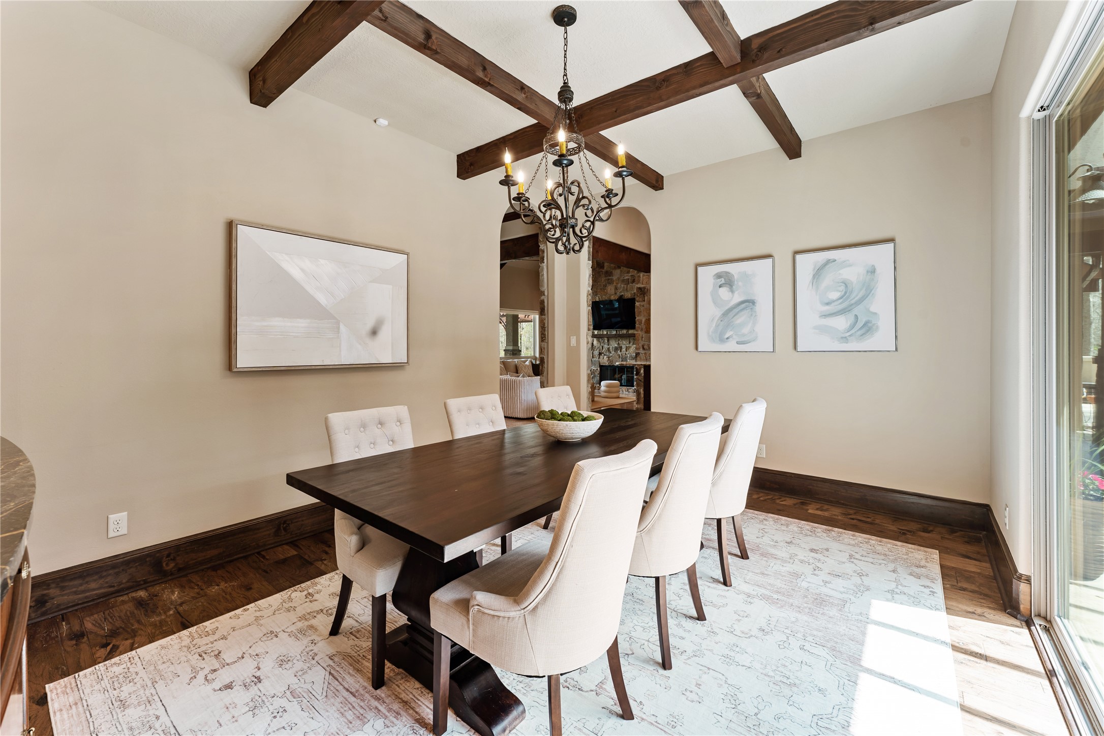 4727 Sugar Maple Court Fulshear, TX 77441 - Photo 17 of 50 a view of a dining room with furniture and a chandelier fan