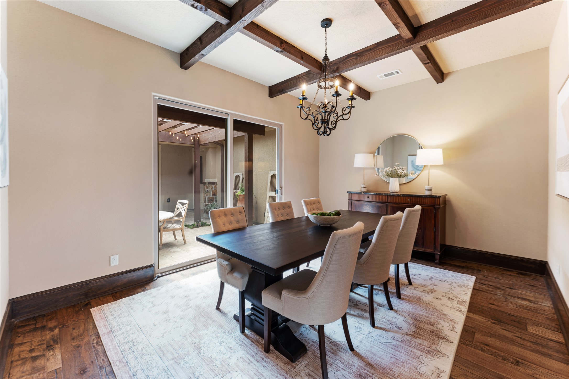 4727 Sugar Maple Court Fulshear, TX 77441 - Photo 18 of 50 a view of a dining room with furniture and wooden floor