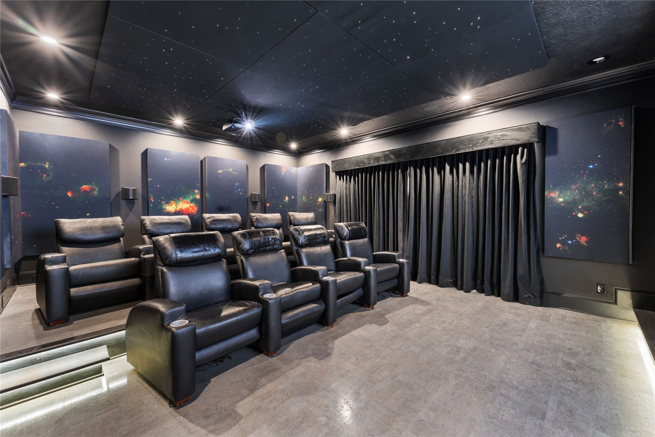 4727 Sugar Maple Court Fulshear, TX 77441 - Photo 21 of 50 a media room with lots of chairs and a projector screen