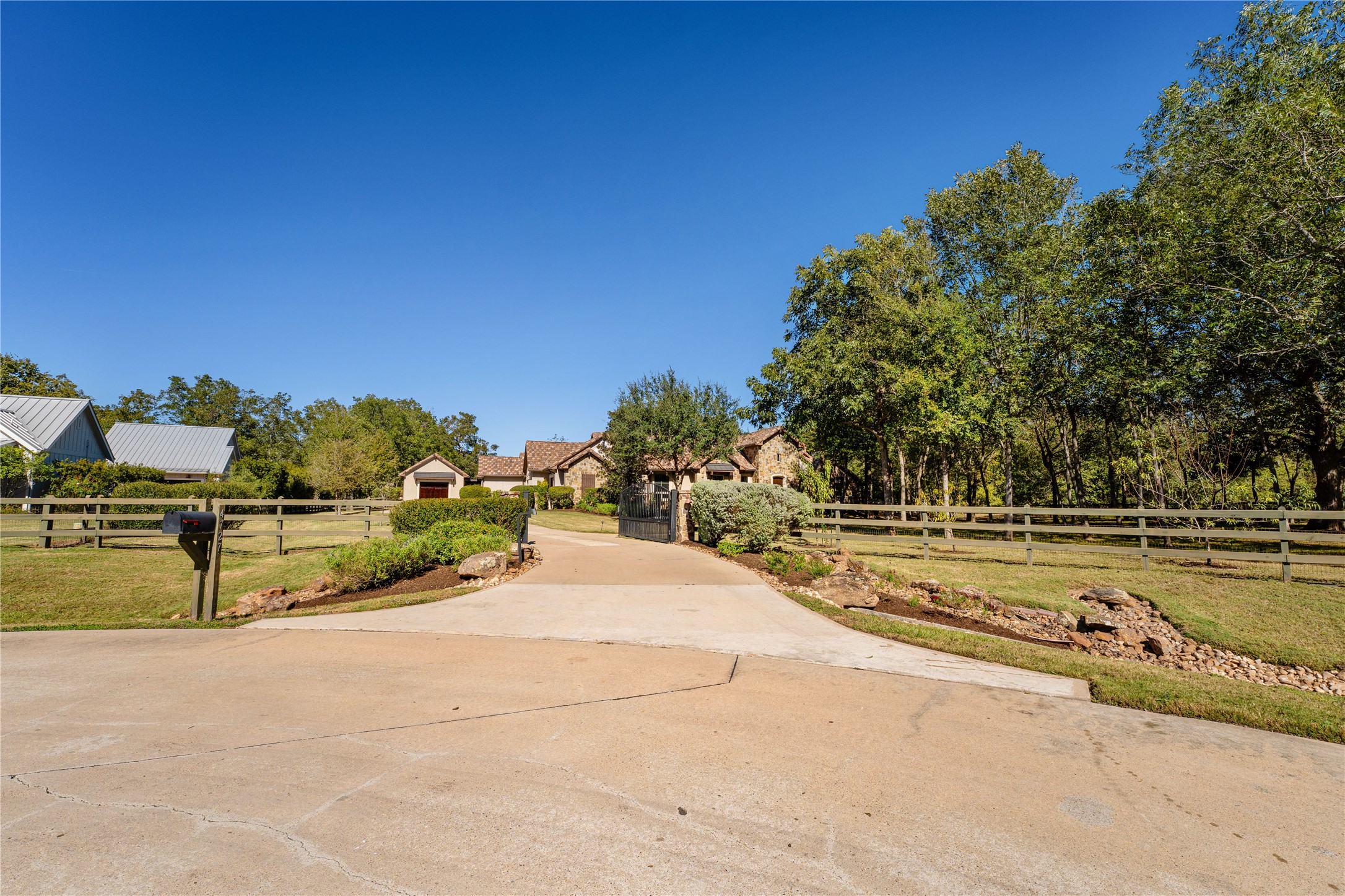 4727 Sugar Maple Court Fulshear, TX 77441 - Photo 2 of 50 a view of a swimming pool with a yard