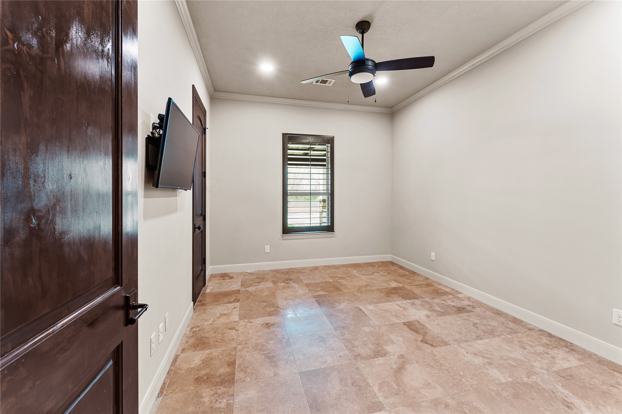 4727 Sugar Maple Court Fulshear, TX 77441 - Photo 30 of 50 a view of an empty room with a window