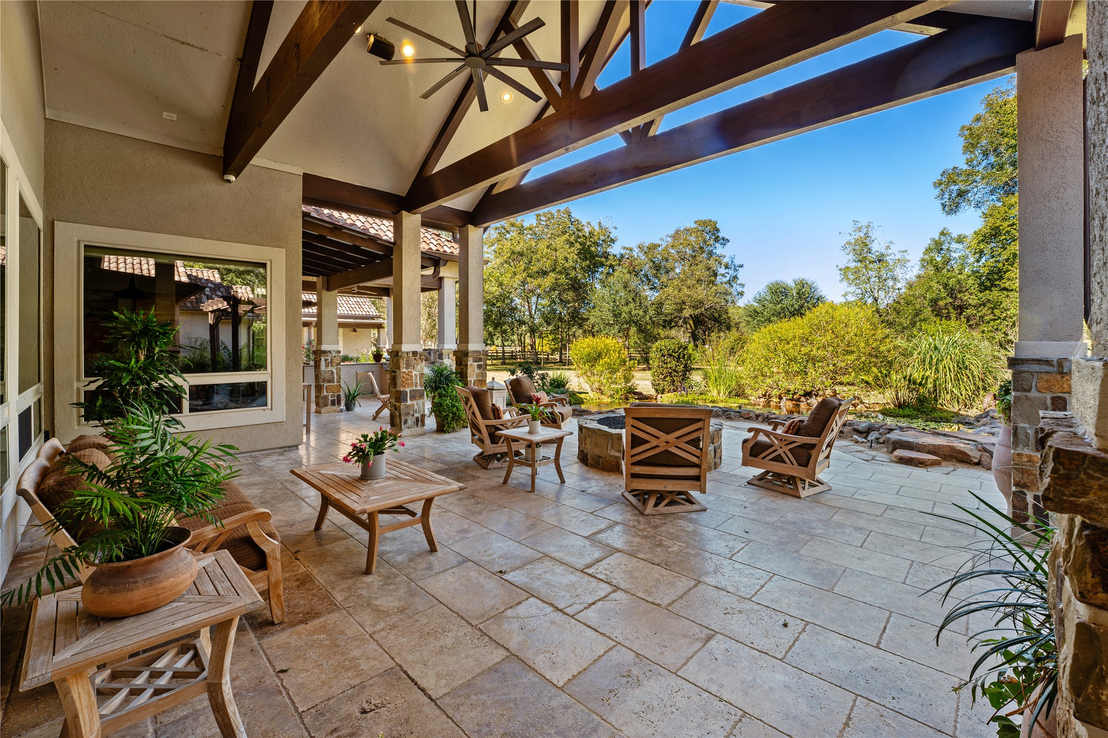 4727 Sugar Maple Court Fulshear, TX 77441 - Photo 37 of 50 a view of a chairs and tables in the patio