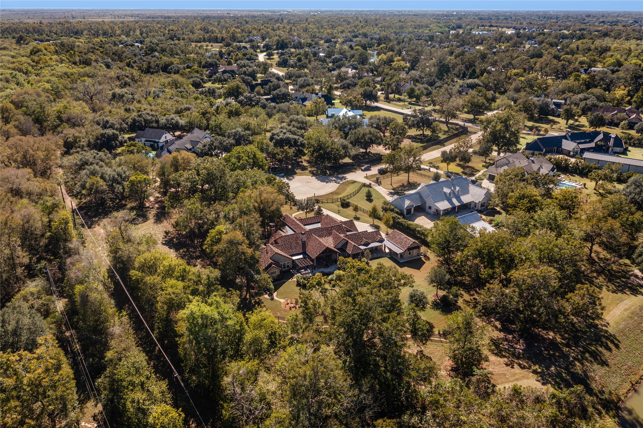 4727 Sugar Maple Court Fulshear, TX 77441 - Photo 46 of 50 Ariel view of the property from the north showing the back of the house including the
detached one car garage/workshop/flex space.